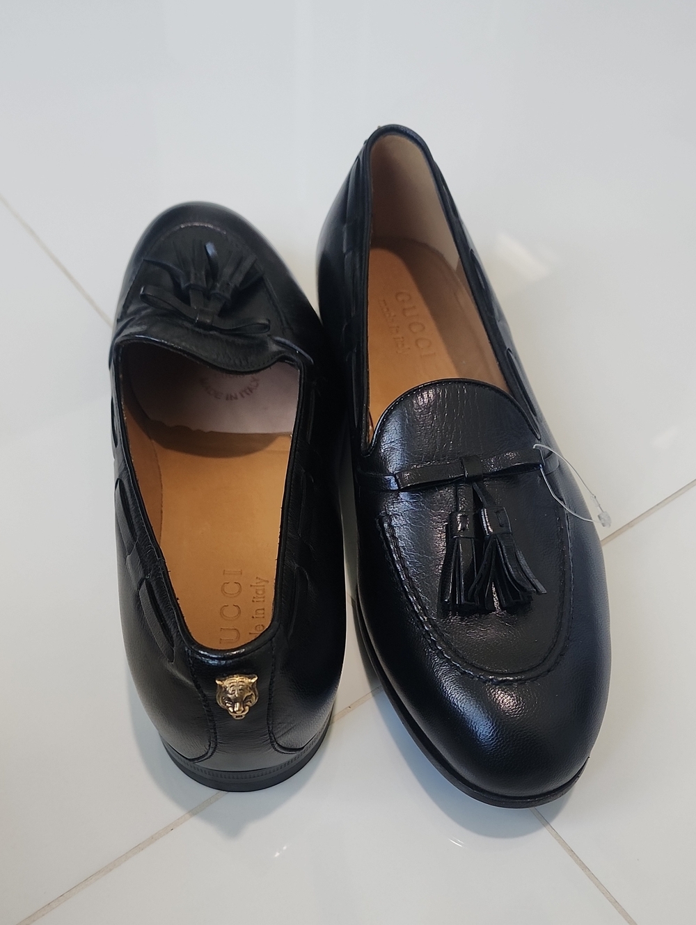 Gucci Black Leather Tassel Loafers with Gold Cat Accent
